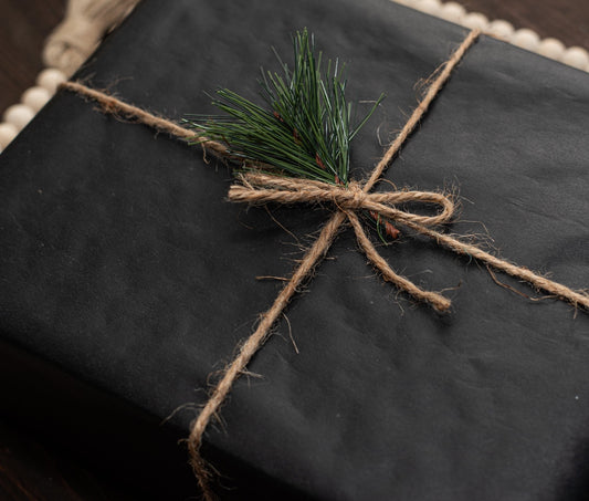 twine bow tied on holiday gift