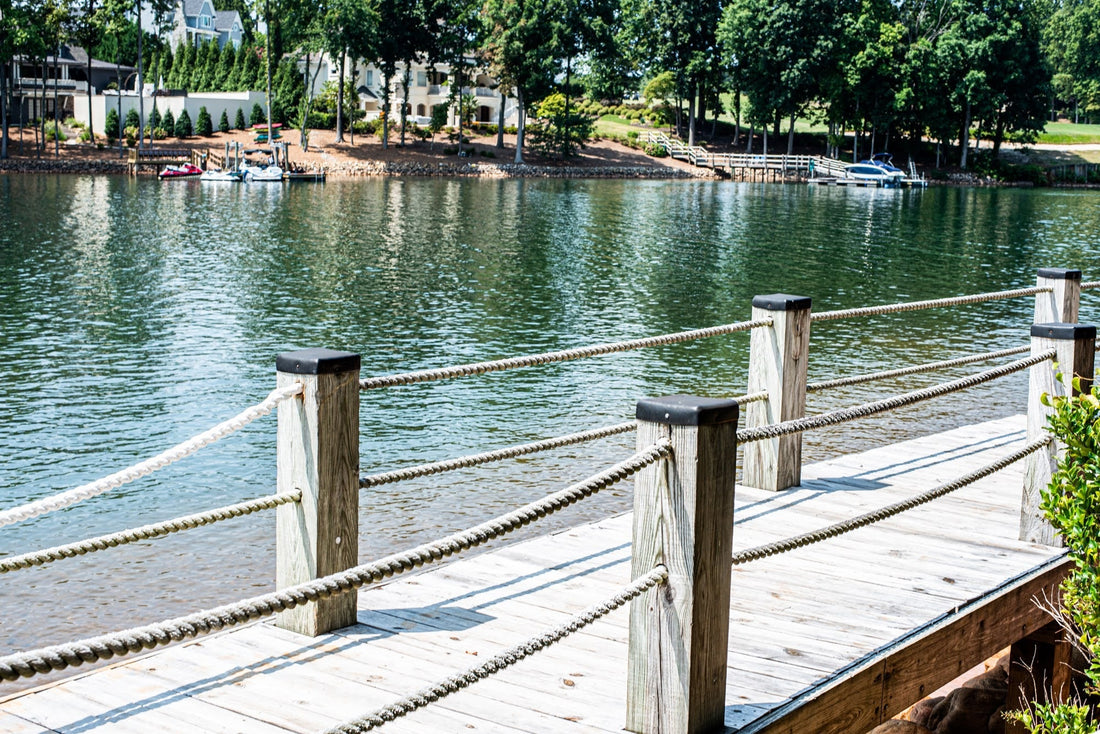 simple rope fence lining backyard dock