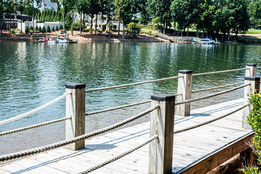 simple rope fence lining backyard dock